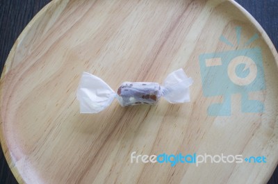 Traditional Soft Caramel Candy In White Wrapped Paper Stock Photo
