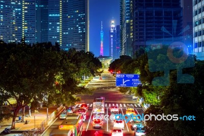 Traffic And Cityscape At Night In Guangzhou, China Stock Photo