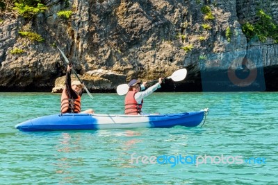 Travel By Boat With A Kayak Stock Photo