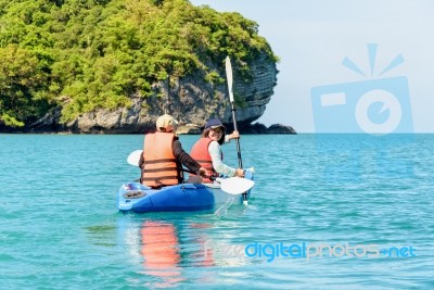 Travel By Boat With A Kayak Stock Photo