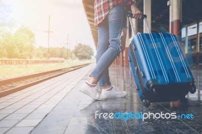 Traveler Girl With A Luggage Waiting For Train On The Station. O… Stock Photo