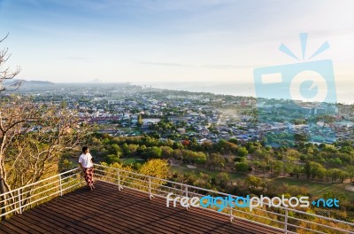 Traveler On View Point Hua Hin City At Sunrise Stock Photo