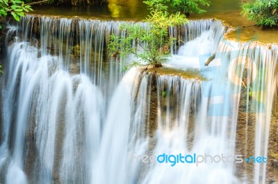 Tropical Waterfall In Kanchanaburi, Thailand Stock Photo