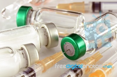 Tuberculin Syringe And Sterile Vial Filled With Medication Solution. An Injection Pharmaceutical Dosage Form Stock Photo