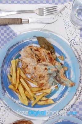 Turkey Steak With French Fries Stock Photo