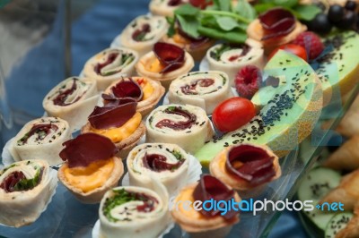 Turkey Wraps And Raspberries, Tomatoes, Melons Stock Photo