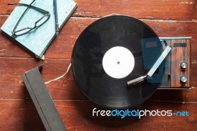 Turntables And Vinyl On Wooden Background Stock Photo