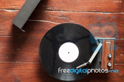 Turntables And Vinyl On Wooden Background Stock Photo