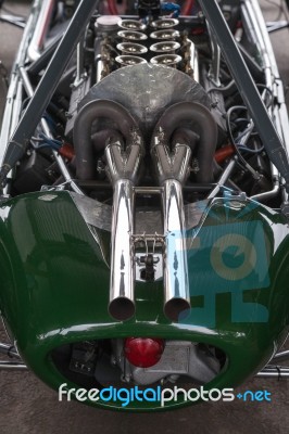 Twin Chrome Plated Exhausts Of A Vintage Racing Car Stock Photo