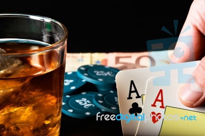 Two Aces And Whiskey Stock Photo