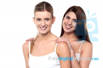 Two Attractive Girls Posing In Sleeveless Spaghetti Stock Photo