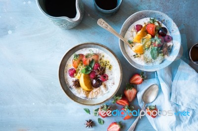 Two Bowls Of Fruit Porridge For Breakfast Stock Photo