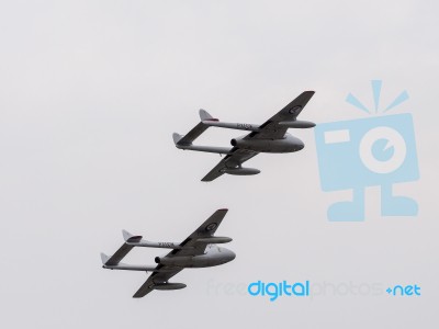 Two De Havilland Vampires Circling Over Dunsfold Airfield Stock Photo