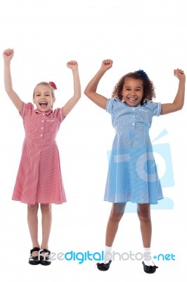 Two Excited Young Girls In Joyous Mood Stock Photo