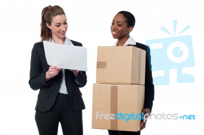 Two Female Workers Discussing Stock Details Stock Photo Two Female Workers Discussing Stock Details Stock Photo