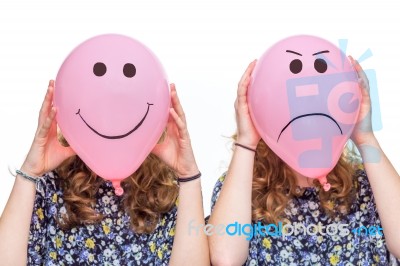 Two Girls Holding Pink Balloons With Facial Expressions For Head… Stock Photo