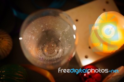 Two Glasses Of Champagne With A Christmas Decor In The Background Stock Photo