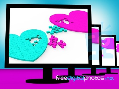 Two Hearts On Monitors Showing Celebrities' Romances Stock Image