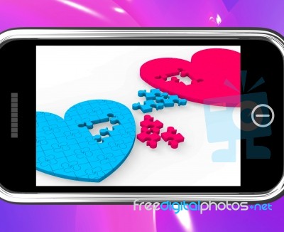 Two Hearts On Smartphone Showing Commitment Stock Image