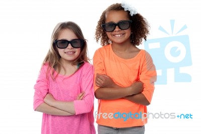 Two Little Girls In Black Sunglasses Stock Photo