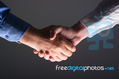 Two Male Businessman Hands Shaking Stock Photo