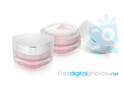 Two Pink Triangle Cosmetic Jar On White Background Stock Photo