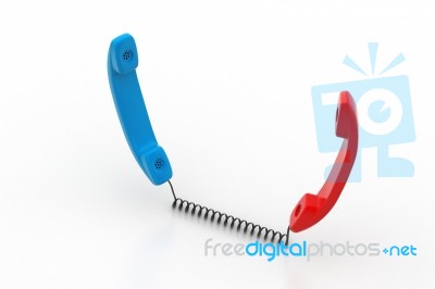 Two Telephones Receivers Connected With A Cable Stock Image