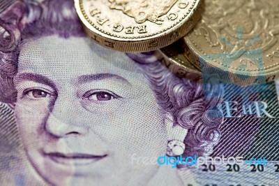 Uk Sterling Money Notes And Coins Stock Photo
