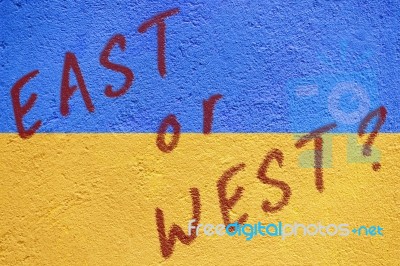 Ukraine Flag Painted On Old Concrete Wall With East Or West Insc… Stock Photo
