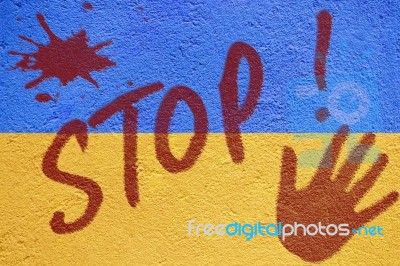 Ukraine Flag Painted On Old Concrete Wall With Stop Inscription Stock Photo