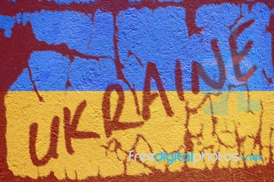 Ukraine Flag Painted On Old Concrete Wall With Ukraine Inscripti… Stock Photo