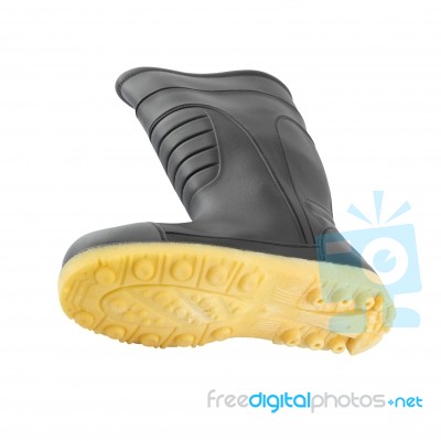Under Rubber Black Boot Shoe On White Background Stock Photo
