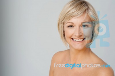 Undressed Lady Over Grey Background Stock Photo