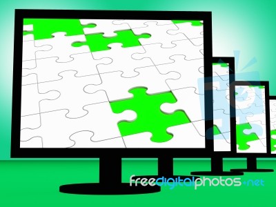 Unfinished Puzzle On Monitors Shows Missing Pieces Stock Image