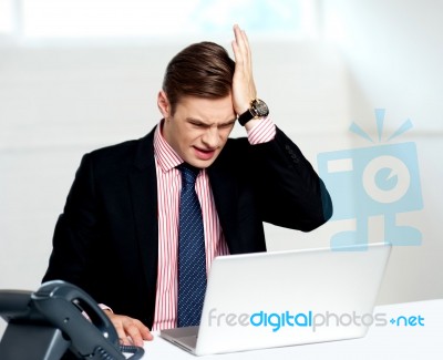 Unhappy Businessperson. Business Loss Stock Photo