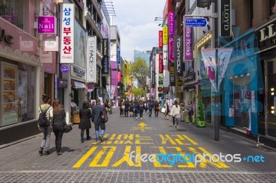 Unidentified People Walking In Myeongdong, South Korea Stock Photo