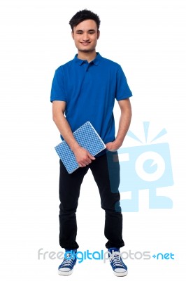 University Student Posing With Notebook Stock Photo