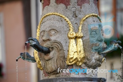 Unusual Water Spout In Rothenburg Stock Photo