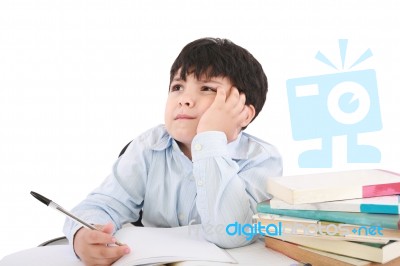 Upset School Boy Doing Homework Stock Photo