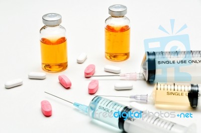 Vaccine / Hypodermic Syringe / Needle / Pills Stock Photo