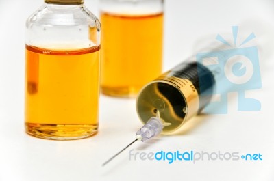 Vaccine With Hypodermic Syringe And Needle Stock Photo