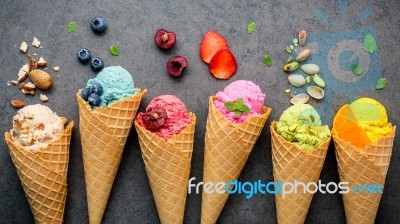 Various Of Ice Cream Flavor In Cones Blueberry ,strawberry ,pist… Stock Photo