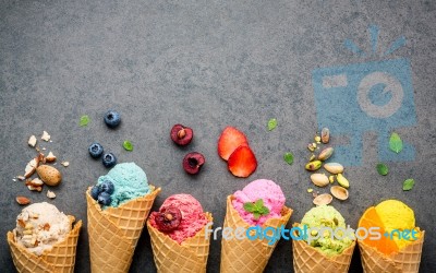 Various Of Ice Cream Flavor In Cones Blueberry ,strawberry ,pist… Stock Photo