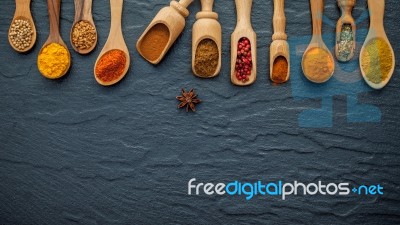 Various Of Indian Spices And Herbs In Wooden Spoons. Flat Lay Of… Stock Photo