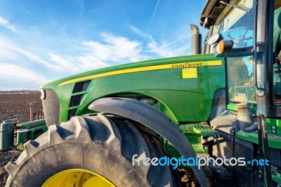 Varna, Bulgaria - March 5, 2017 Ploughing A Field With John Deer… Stock Photo