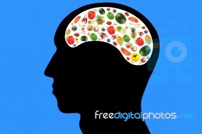 Vegetables And Fruits In Head On Blue Background Stock Photo