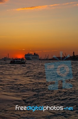 Venice Italy Sunset With Cruise Boat Stock Photo