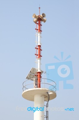 Vertical Warning Tower Tsunami On Blue Sky Stock Photo