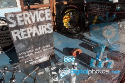 Very Old Cycle Repair Shop In East Grinstead Stock Photo