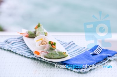 Vietnamese Spring Rolls With Vegetables And Coriander On A Plate… Stock Photo